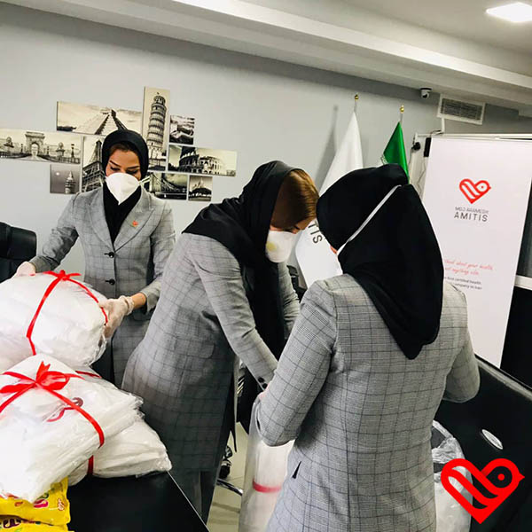 Preparation and donation of gown and face mask by Amatis Company